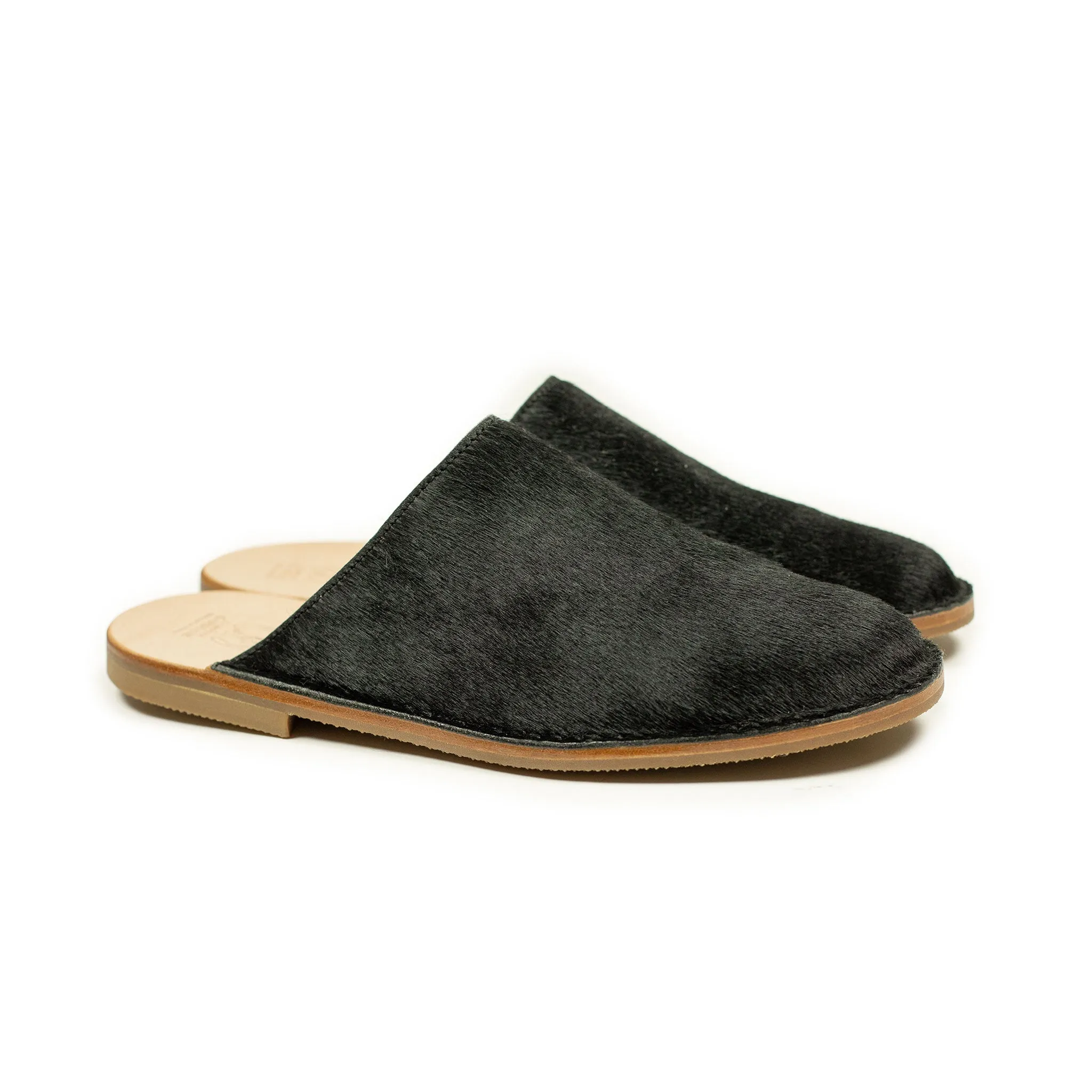 Exclusive mules in black hair-on calf