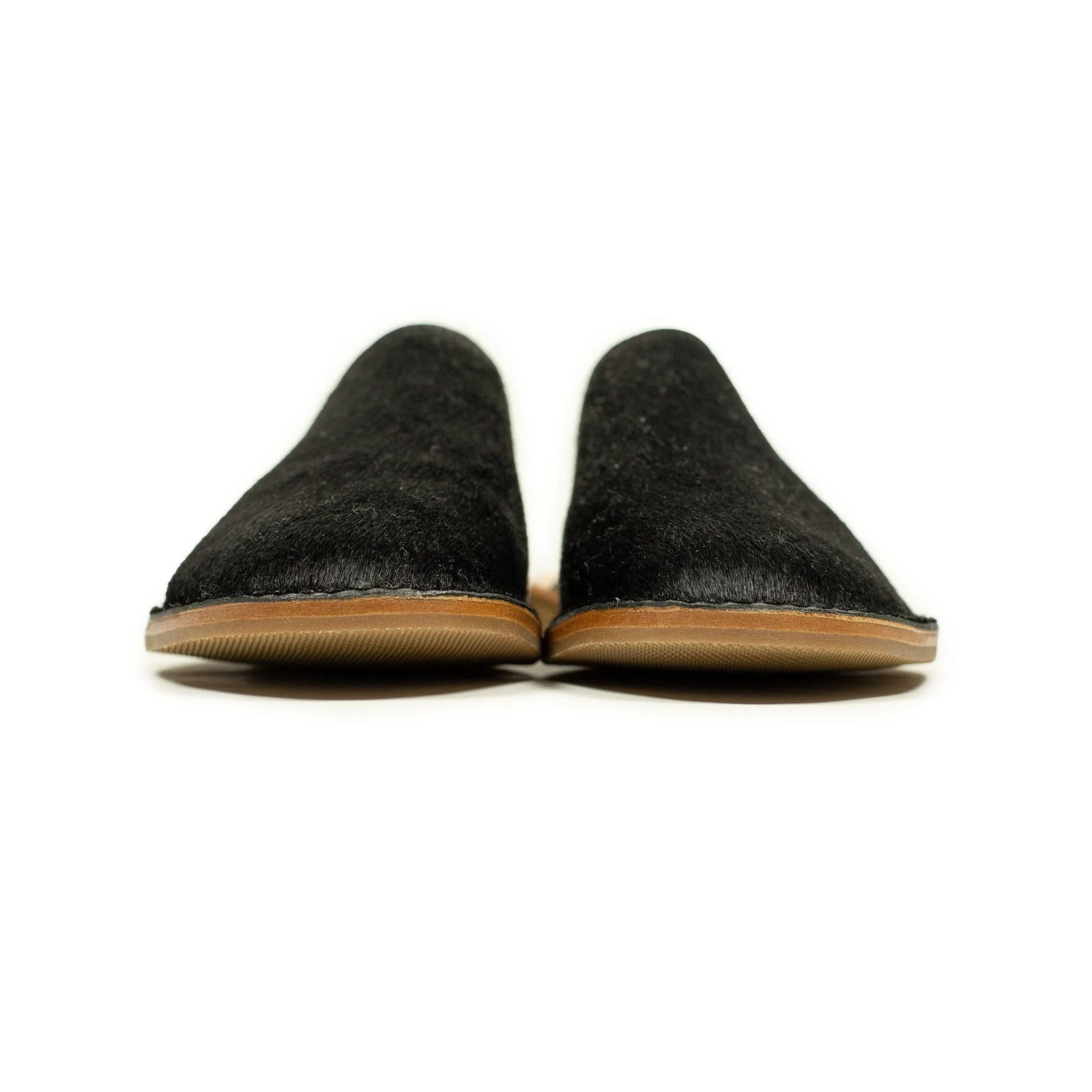 Exclusive mules in black hair-on calf