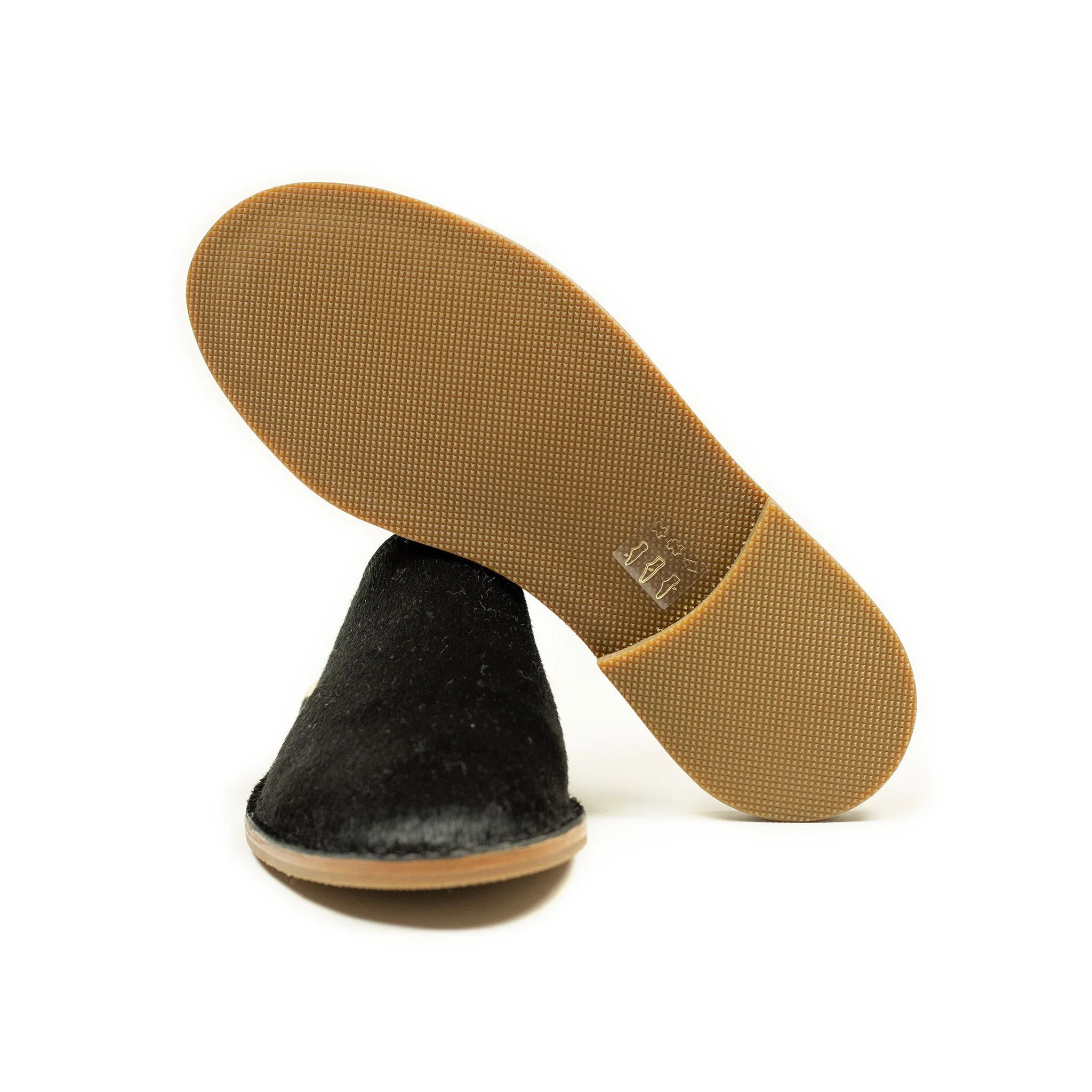 Exclusive mules in black hair-on calf